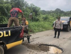 Polsek BTS Ulu Bergerak Cepat Tangani Jalan Rusak di Desa Tambangan